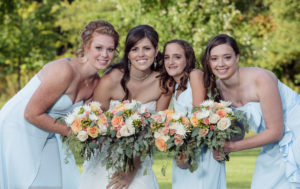 bride-flowers-bridesmaid-sister